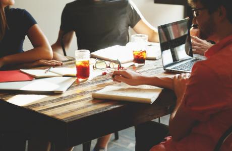 people working around a table